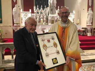 Presentation of St. Brendan Medal to Paddy Duffy for his many years of service to St. Brendan's Parish.